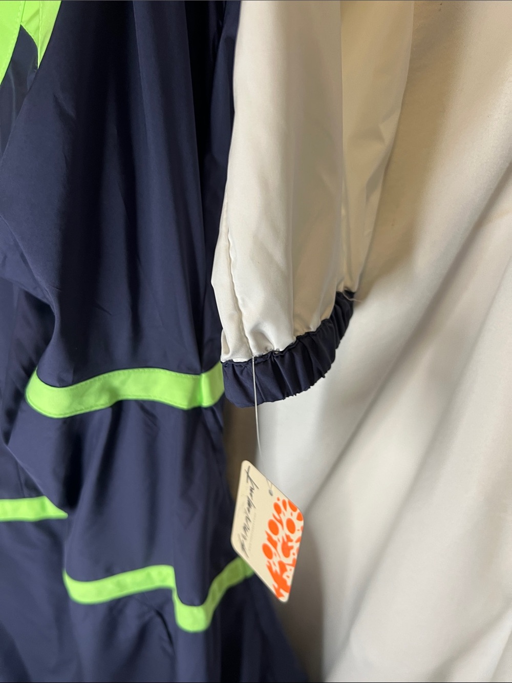 FP Movement Cares By The Wind block Logo in Navy and Lime Green Jacket. - Picture 4 of 13